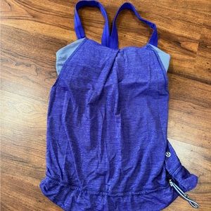Lululemon tank with built in bra. Size 4. Fits a little tight